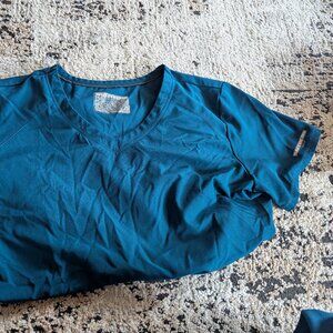 Varying colors size M and one size L Skechers scrub vitality tops